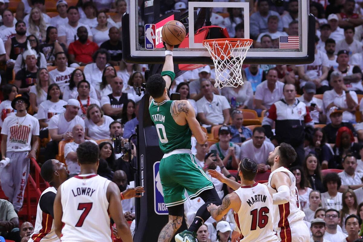 Jayson Tatum #0 of the Boston Celtics drives to the basket ahead of Caleb Martin #16 of the Miami Heat. (Photo by Megan Briggs/Getty Images)