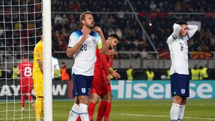 <p>England's Harry Kane and Phil Foden stand dejected after a missed chance.</p>
