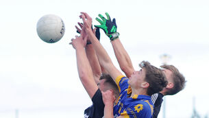 <p>BIG IMPACT: Tadgh Gosney of Presentation Secondary School, Milltown, in Corn Uí Mhuirí action. Pic: Denis Minihane.</p>
