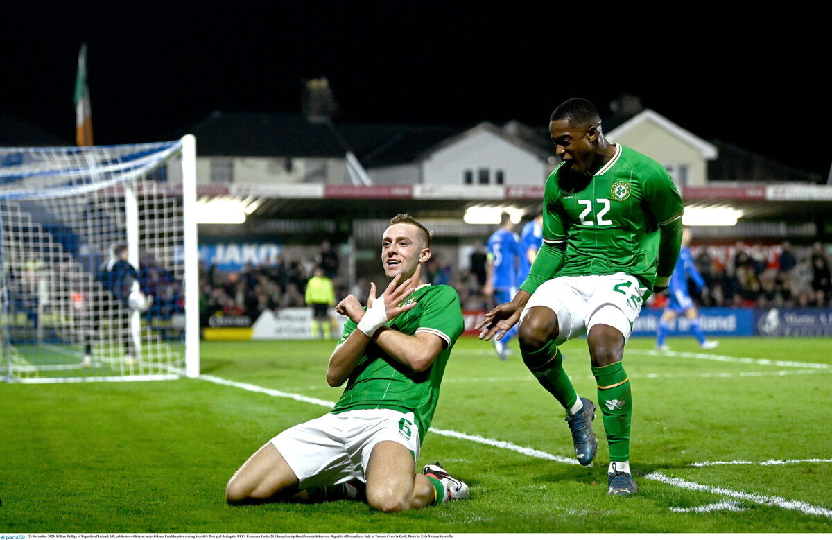 Killian Phillips of Republic of Ireland, left, celebrates with team-mate Aidomo Emakhu after scoring his side's first goal during the UEFA European Under-21 Championship Qualifier match between Republic of Ireland and Italy at Turners Cross in Cork. Photo by Eóin Noonan/Sportsfile Killian Phillips of Republic of Ireland, left, celebrates with team-mate Aidomo Emakhu after scoring his side's first goal during the UEFA European Under-21 Championship Qualifier match between Republic of Ireland and Italy at Turners Cross in Cork. Photo by Eóin Noonan/Sportsfile
