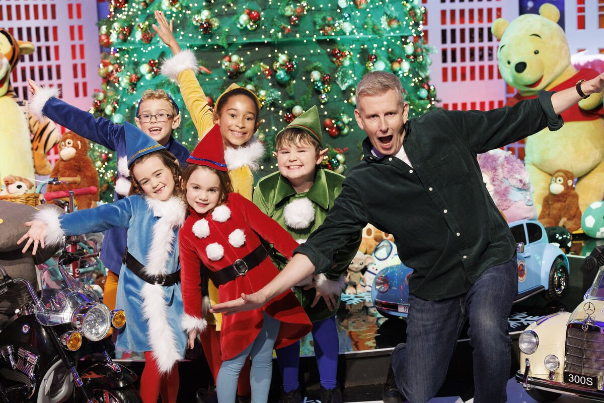 Patrick Kielty with some of his helper elves on the Toy Show set. Picture: Andres Poveda Patrick Kielty with some of his helper elves on the Toy Show set. Picture: Andres Poveda