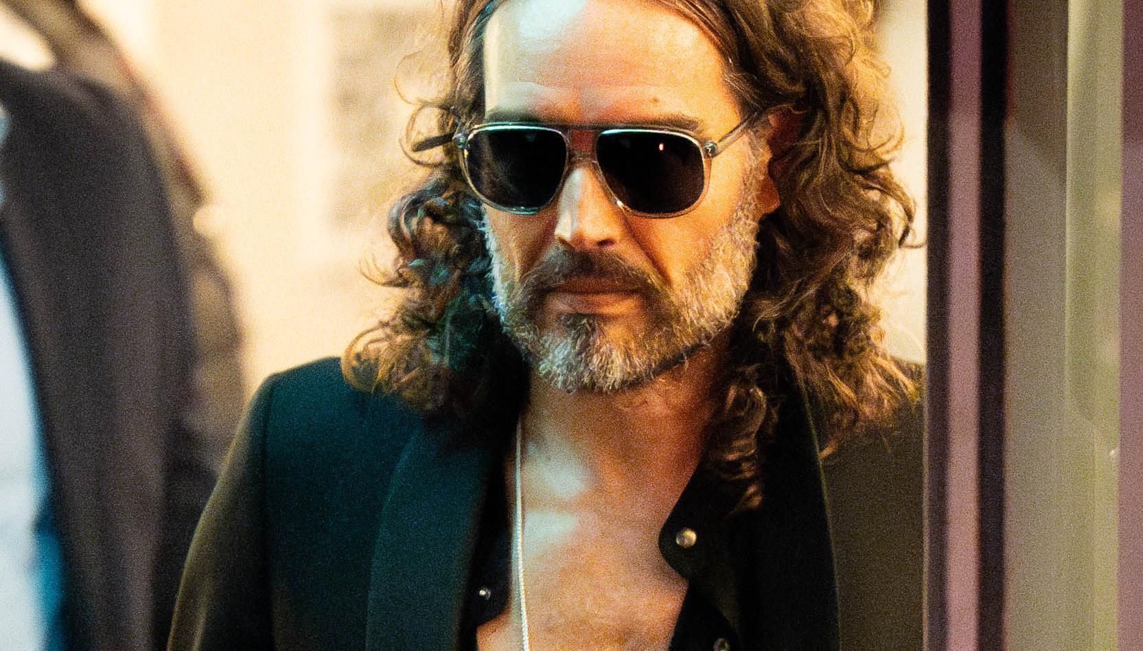Russell Brand, who has been interviewed under caution by the London Metropolitan Police over allegations of sexual offences.