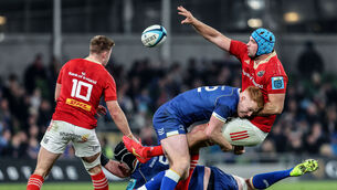 <p>TAKE THAT: Munster’s Tadhg Beirne is tackled by Ciarán Frawley of Leinster </p>