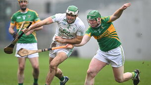 <p>Paddy Deegan of O'Loughlin Gaels is tackled by Oisín Mahon of Kilcormac-Killoughey in Tullamore. Picture: Piaras Ó Mídheach/Sportsfile</p>