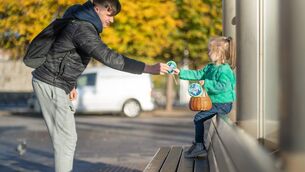 <p>Daphne, aged 3, from Ballyfermot, spreading the Giving Tuesday message at Heuston Station</p>