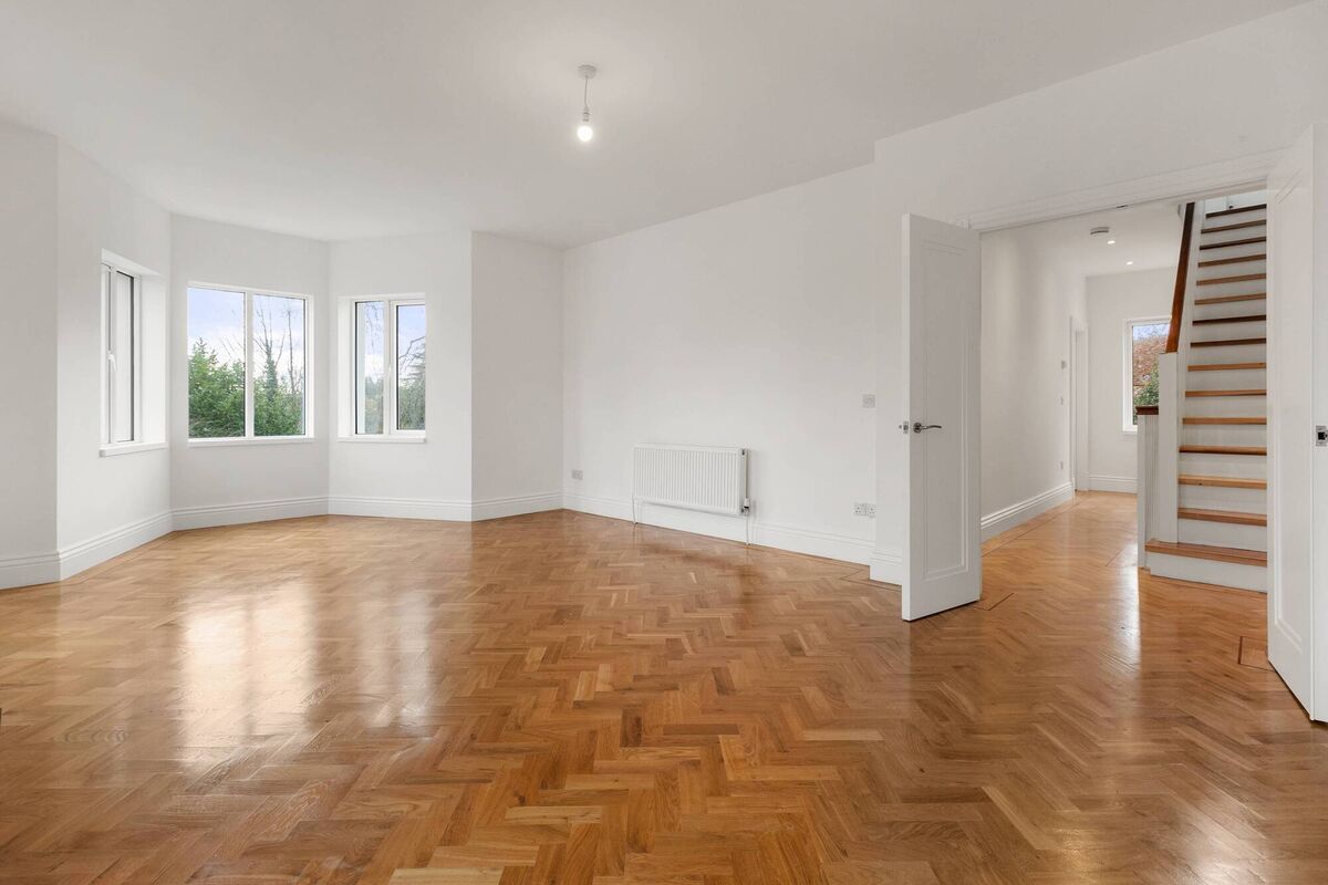 First floor living room with solid oak parquet floors