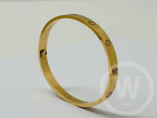 An 18-carat gold Cartier bracelet is also on the list. Picture: Wilsons Auctions