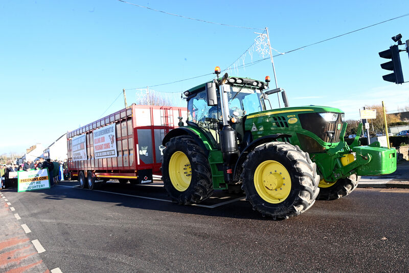  A tractor and trailer leads the march down the main street in Carrigaline. Picture: Larry Cummins