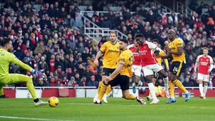 <p>Arsenal's Bukayo Saka scores Arsenal's first goal of the game.</p>