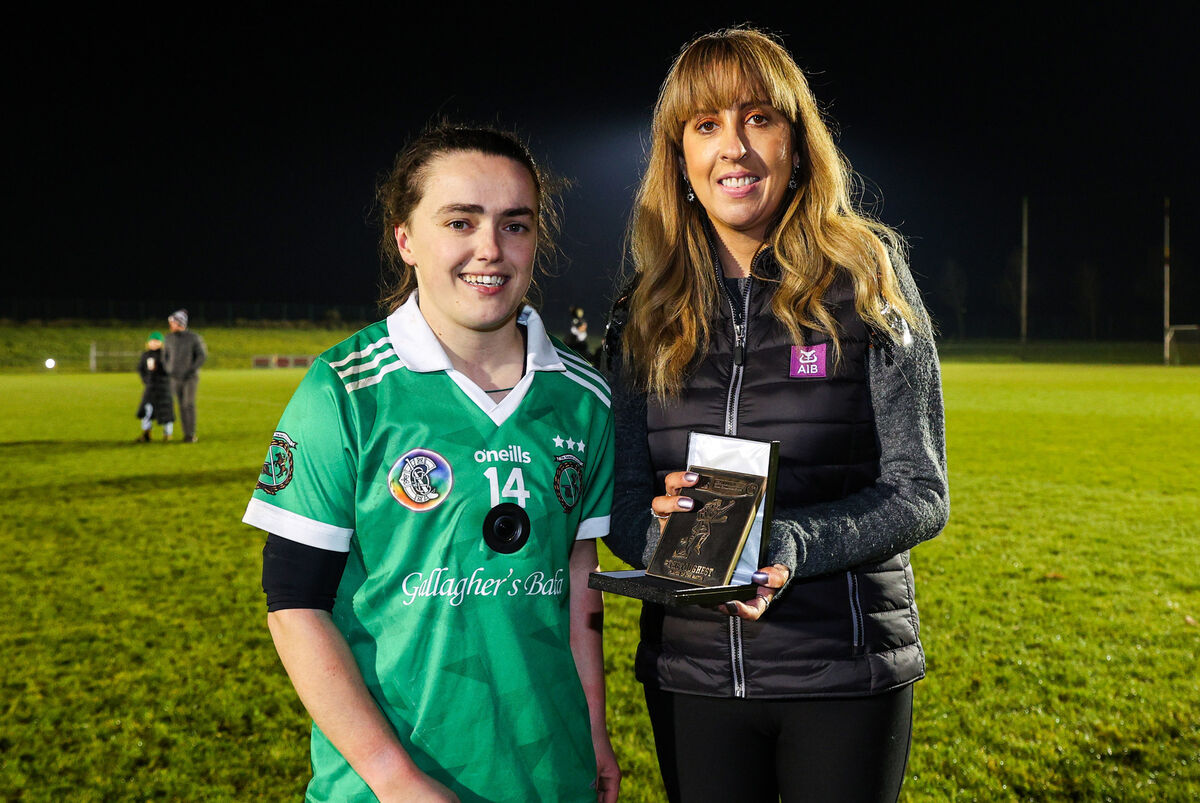 Sarsfield Galway’s Siobhan McGrath is awarded the Player of the Match Award by Maura Twomey from AIB.