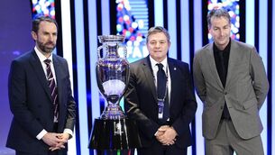 <p>The head coaches of England Gareth Southgate, right, Serbia Dragan Stojkovic, center, and Denmark Kasper Hjulmand, left, pose next to the trophy.</p>