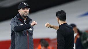 <p>BIG DOGS: Liverpool manager Jurgen Klopp greets Arsenal manager Mikel Arteta.</p>