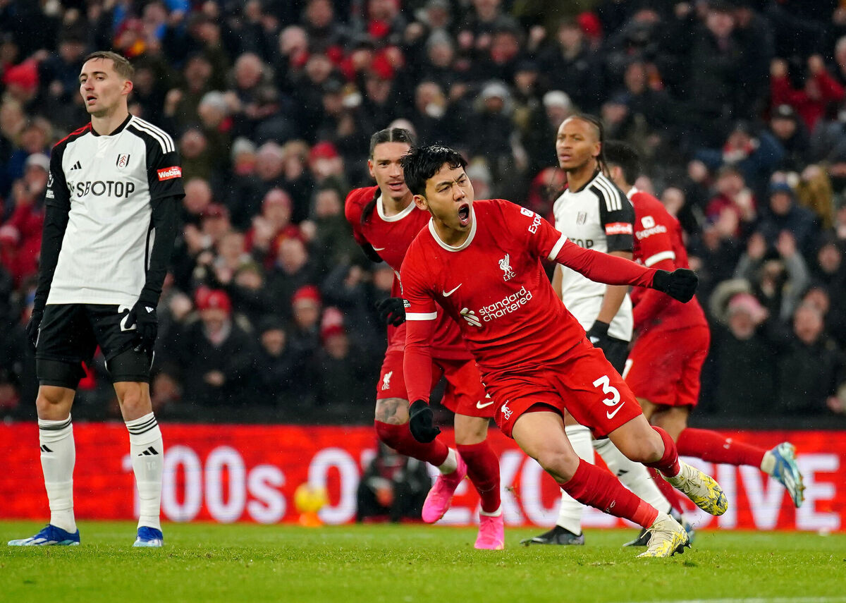 Liverpool's Wataru Endo celebrates scoring his sides third goal.
