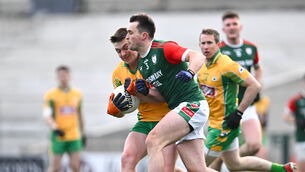 <p>DIFFERENCE-MAKER: Brian Cogger of Corofin in action against Brian Stack of St Brigid's. Pic: Piaras Ó Mídheach/Sportsfile</p>