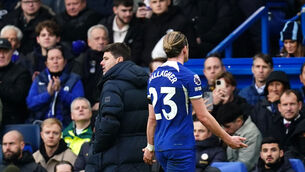 <p>WEATHERING THE STORM: Chelsea's Conor Gallagher leaves the pitch past manager Mauricio Pochettino after being shown a red card. Pic: John Walton/PA Wire.</p>