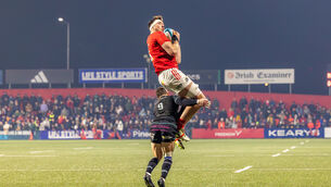 <p>FLYING HIGH: Munster's Tom Ahern taken in the air by Glasgow Scrumhalf Sean Kennedy. Pic: Kieran Ryan-Benson</p>