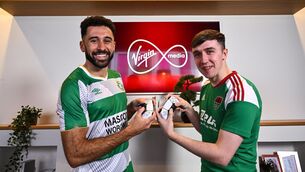 <p>Roberto Lopes of Shamrock Rovers, left, and E Republic of Ireland player Ciaran Walsh.</p>