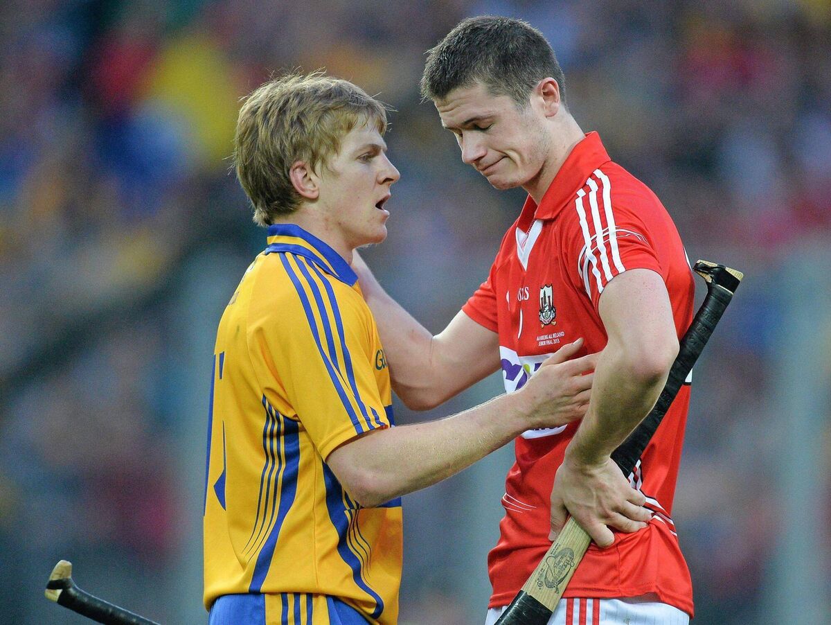 2013: Podge Collins, Clare, with Seamus Harnedy, Cork, after the final whistle. Pic: Brendan Moran / SPORTSFILE