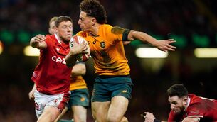 <p>SWITCHING CODES: Australia's Mark Nawaqanitawase breaks through the Wales defence to score his second try of the game during the Autumn International match at Principality Stadium. Pic: David Davies/PA Wire.</p>
