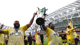 <p>Uini Atonio and Georges-Henri Colombe of La Rochelle celebrate their victory in last May's Champions Cup Final.</p>