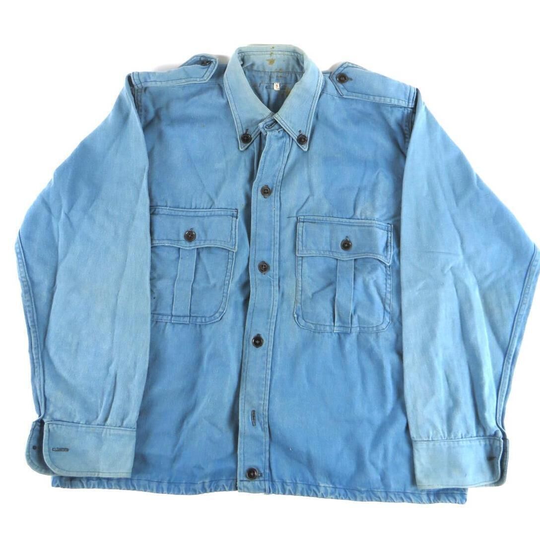 An original Army-issue Blueshirt tunic at Fonsie Mealy. An original Army-issue Blueshirt tunic at Fonsie Mealy.