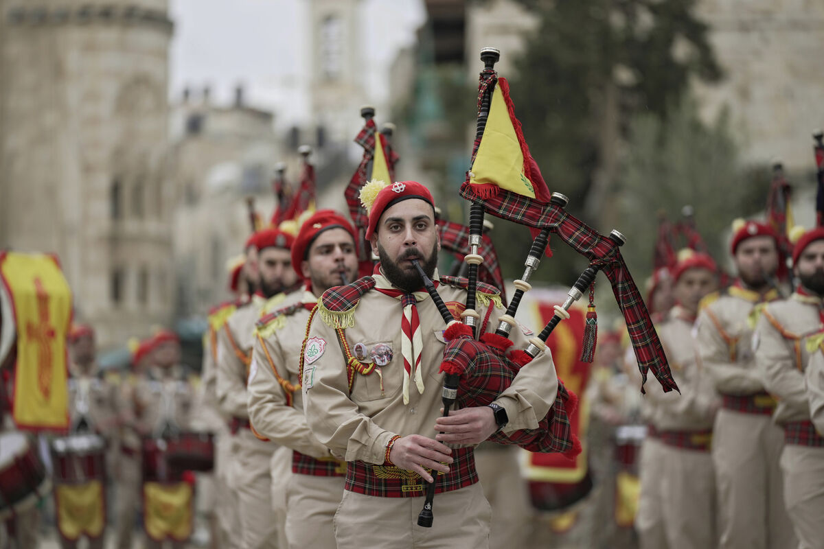 A Palestinian Christian scout band leading a Christmas Eve parade through Manger Square at the Church of the Nativity in Bethlehem, Palestine, in 2021. Piccture: Majdi Mohammed/AP