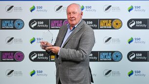 <p>8 December 2023; Liam Brady with the International Achievement Award during the SSE Airtricity / Soccer Writers Ireland Awards 2023 at the Dublin Royal Convention Centre in Dublin. Photo by Stephen McCarthy/Sportsfile</p>