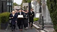Billionaire who gave away his fortune is laid to rest in Dublin