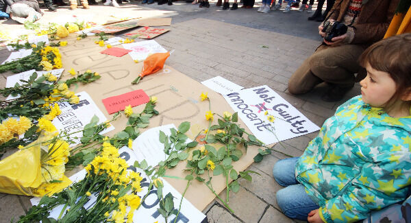 Maggie O’Neill looks at the flowers at the Limerick protest. Aisling Murphy and Kiristin Tocci at the solidarity rally at City Hall, Picture: Brendan Gleeson Maggie O’Neill looks at the flowers at the Limerick protest. Aisling Murphy and Kiristin Tocci at the solidarity rally at City Hall, Picture: Brendan Gleeson