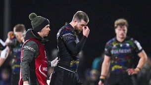 <p>INJURED: Connacht's Mack Hansen leaves the pitch to receive medical attention. Pic: Seb Daly/Sportsfile</p>