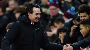 <p>Aston Villa manager Unai Emery greets fans following victory over Arsenal</p>
