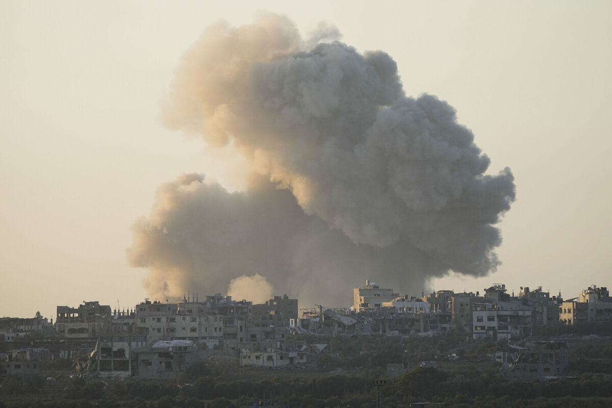 Smoke rises following an Israeli bombardment in the Gaza Strip, as seen from southern Israel on Monday, Dec. 11, 2023. The army is battling Palestinian militants across Gaza in the war ignited by Hamas' Oct. 7 attack into Israel. (AP Photo/Ohad Zwigenberg)