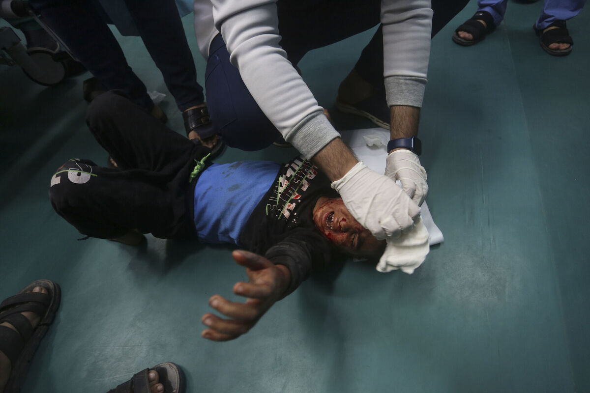 Palestinians wounded in the Israeli bombardment of the Gaza Strip are brought to a hospital in Rafah, Monday, Dec. 11, 2023. (AP Photo/Hatem Ali)