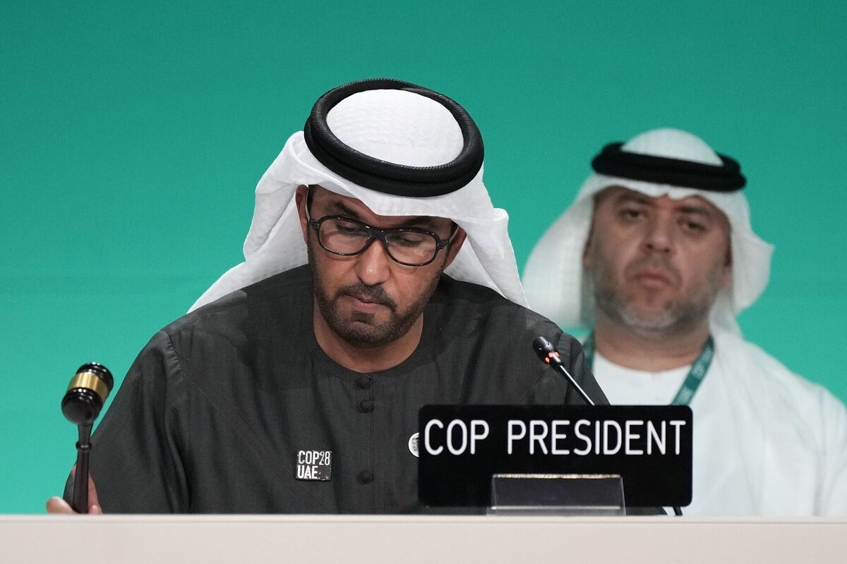 COP28 President Sultan al-Jaber bangs the gavel during a stocktaking plenary session at the COP28 U.N. Climate Summit, Monday, Dec. 11, 2023, in Dubai, United Arab Emirates. (AP Photo/Rafiq Maqbool)
