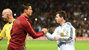 <p>LEGENDS: Portugal's Cristiano Ronaldo and Argentina's Lionel Messi shake hands. Pic: Martin Rickett/PA Wire.</p>
