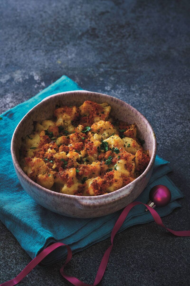 Cheat a little by serving this creamy cauliflower cheese with Parmesan and truffle oil, one of the many pre-prepared side-dishes you can buy from the Deluxe range at Lidl.