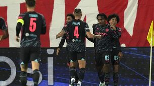 <p>Micah Hamilton, second right, broke the deadlock (Darko Vojinovic/AP)</p>