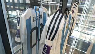 A shirt worn by Lionel Messi in a match for Argentina against Saudi Arabia in the 2022 Fifa World Cup on display at Sotheby’s in New York (Peter K Afriyie/AP)