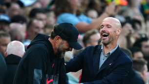 Jurgen Klopp, left, is not focusing on Erik ten Hag’s side’s problems (David Davies/PA)