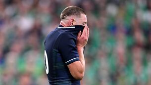 <p>FRUSTRATED: A dejected Finn Russell after defeat to Ireland in Paris in October's Word Cup pool clash.</p>