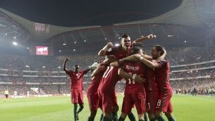 World Cup round-up: Portugal secure win and ticket to Russia