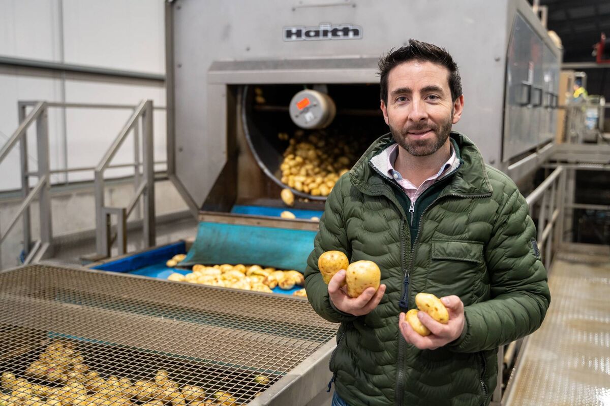 Ross Keogh, shown sorting potatoes on the farm. 