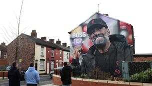 <p>WATCH YOUR HOUSE: A mural depicting Jurgen Klopp outside Anfield ahead of Sunday's game with Man Utd. Picture: Clive Brunskill/Getty Images</p>