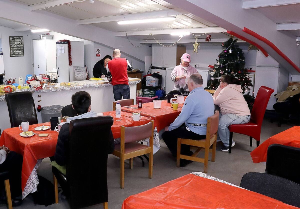 People enjoying a sit-in meal at the Waterford Helping The Homeless facility. Picture: Noel Browne