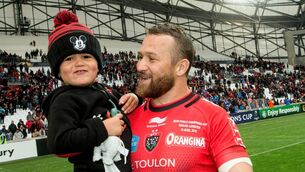 <p>NOT DONE YET: Matt Giteau celebrates with his son Levi in 2015. Pic: ©INPHO/James Crombie </p>