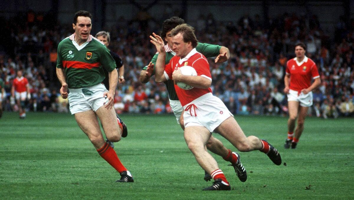 Teddy McCarthy of Cork in action against Jimmy Browne, left, and Peter Ford of Mayo during the All-Ireland Senior Football Championship Final between Cork and Mayo at Croke Park in Dublin. Teddy McCarthy of Cork in action against Jimmy Browne, left, and Peter Ford of Mayo during the All-Ireland Senior Football Championship Final between Cork and Mayo at Croke Park in Dublin.