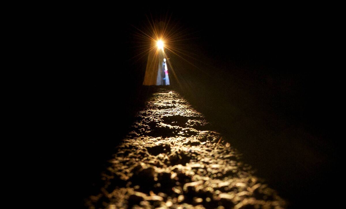 The sun shines along the passage floor into the inner chamber at Newgrange during the Winter Solstice. Picture: Alan Betson / The Irish Times 