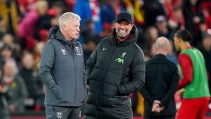 <p>RED ROAR: Klopp with West Ham boss David Moyes</p>