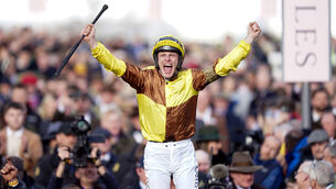 <p>Paul Townend celebrates winning the Boodles Cheltenham Gold Cup Chase aboard Galopin Des Champs. Picture: Mike Egerton/PA Wire</p>