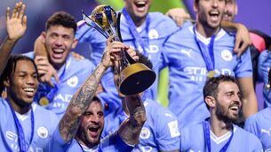 <p>Manchester City's Kyle Walker lifts the trophy after they win the FIFA Club World Cup 2023 final. Photo credit: PA Wire.</p>
